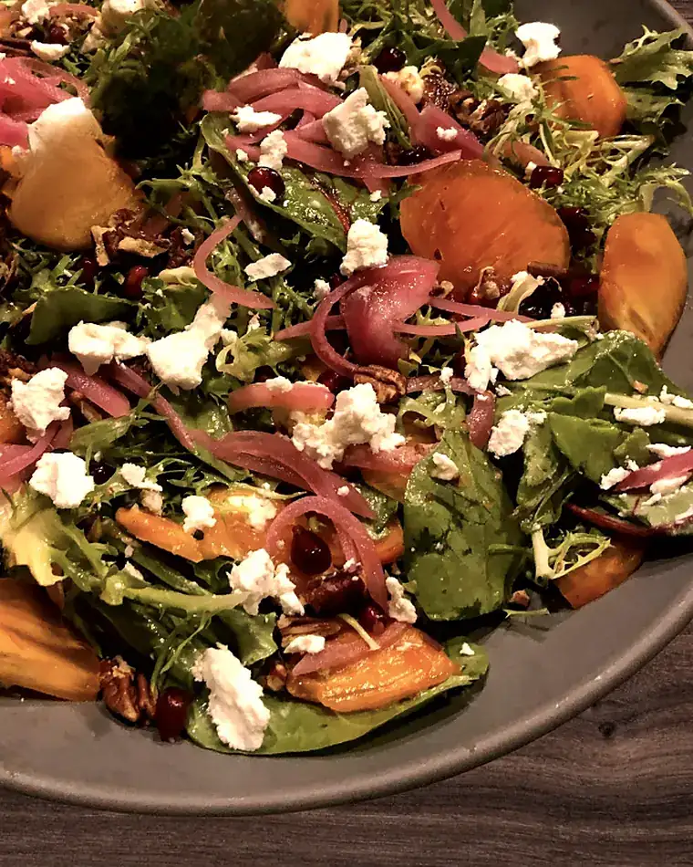 Autumn salad of persimmon, pickled onion, feta and toasted pecans